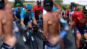 The cheek of it! Tour de France rider slaps mooning fan on backside (VIDEO)