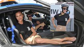 ‘Buckle up!’ Russian stunner Irina Shayk ditches heels to get behind wheel of Formula-E car (PHOTOS)