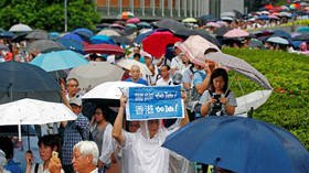 100,000+ brave rain in Hong Kong in show of support for police (VIDEO)