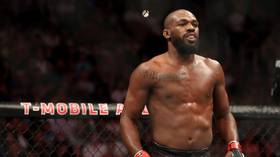UFC champ Jon Jones charged with battery after 'placing waitress in chokehold at strip club'