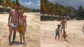 'He's a normal dad!' Youngster enjoys dream beach kickabout with Messi after holiday meeting (VIDEO)
