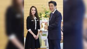 Puppy talk: Russian Olympic figure skating champ Zagitova chats pet dogs with Japan PM Abe