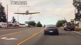 Brakes on a plane: WATCH pilot stop miraculously short of busy intersection after EMERGENCY LANDING