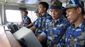 Vietnam says Chinese survey ship left its exclusive economic zone