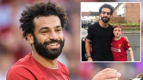 Mo Salah poses with young fan who broke his nose trying to greet Liverpool star (PHOTOS)