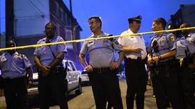 Philadelphia shooter surrenders after hours-long standoff with police