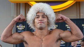 Why does this American MMA fighter wear Khabib’s famous papakha hat?