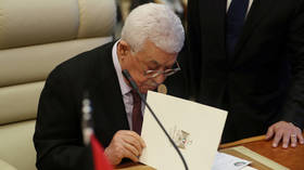 Palestinian President Abbas fires all advisers amid West Bank financial crisis
