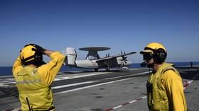 Oops! Turboprop plane hits 4 Hornet jets amid bumpy landing on USS Abraham Lincoln (VIDEO)