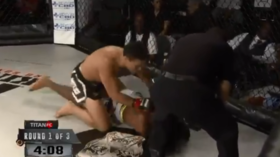 Fury as MMA referee appears to ignore fighter tapping out THREE TIMES during brutal barrage (VIDEO)
