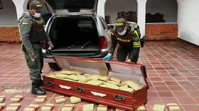 Can’t take it with you: Colombian cops find 300kg of cannabis INSIDE coffins (VIDEO)