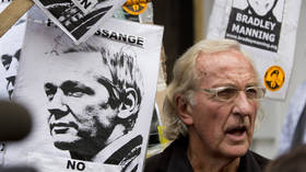 ‘His psychological torture is unabated’: John Pilger reveals Assange prison conditions