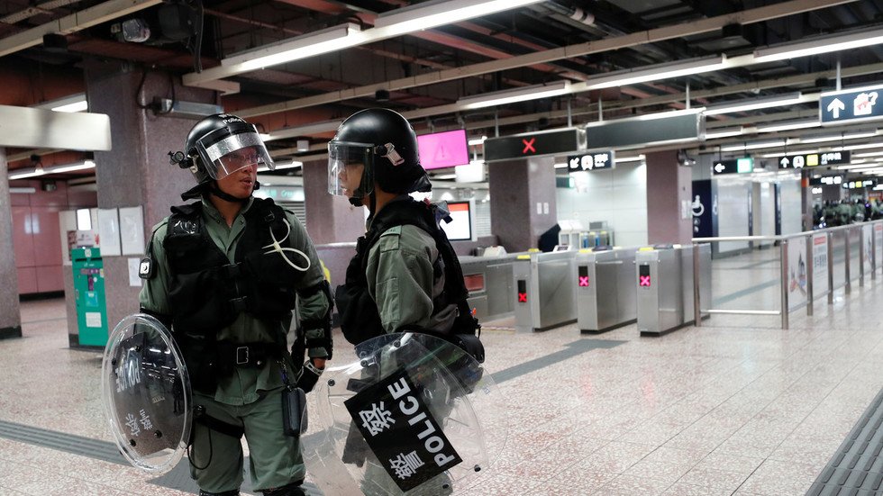 Trains to Hong Kong airport suspended as protesters vow to disrupt mass ...