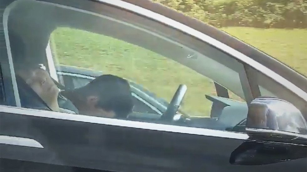 Tesla driver filmed in deep sleep as his vehicle speeds down busy