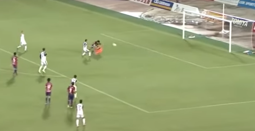 Most bizarre goal ever? Japanese footballer somehow scores LYING DOWN ...