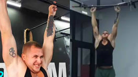 Finger power: Russian breaks record for longest two-finger bar hang (VIDEO)