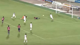Most bizarre goal ever? Japanese footballer somehow scores LYING DOWN after header hits post (VIDEO)