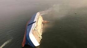 Dramatic rescue operation underway to save 4 trapped inside capsized cargo vessel (PHOTO, VIDEO)