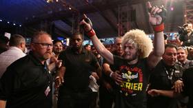 Poirier UFC shirt worn by Khabib raises $100K for charity