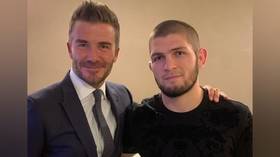 Bumping into Beckham: UFC champ Khabib meets England legend at PSG-Real Champions League game