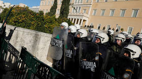 Police evict over 200 migrants from Athens squats