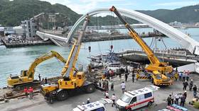 Jaw-clenching moment a Taiwan bridge with oil tanker attempting to cross it collapses caught on VIDEO