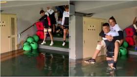 Rugby World Cup stars forced to 'swim' to training in typhoon-hit Japan (VIDEO)