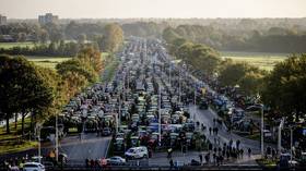 WATCH: Dutch farmers clog roads with tractors & machinery over climate change blame