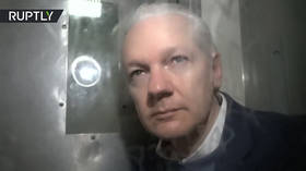 WATCH: Rare glimpse of Julian Assange INSIDE prison van
