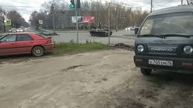 WATCH ‘tank’ run a red light & RAM a car at a busy intersection in Russia (VIDEO)