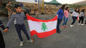 Lebanon protesters block roads, defy pleas from top leaders