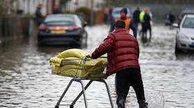 UK suffering temperature plunge & ‘almost Biblical’ flooding after month of rain falls in 1 day (PHOTOS, VIDEOS)