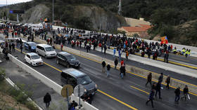 Independence protesters in Catalonia block major Spain-France road link