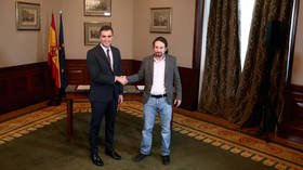 Spain’s Socialists, Podemos sign pact on ‘progressive’ coalition govt