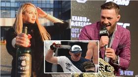 Not proper: MMA veteran slams ‘stupid’ Russian blonde for posing with McGregor’s whiskey outside youth hockey club