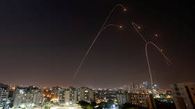 WATCH hundreds of drones create dreamlike spectral PLANES at Chinese air show