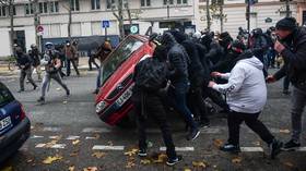 ‘Morons, bullies & thugs’: French interior minister hits back at ‘ultras’ at Yellow Vests after Saturday mayhem in Paris