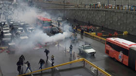 Officer killed, police stations STORMED by protesters amid anti-fuel hike rallies in Iran