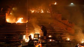 Protesters set Hong Kong university on FIRE, launch petrol bombs as riot police block campus (VIDEOS)