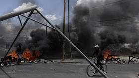 ‘He died in my hands’: 3 pro-Morales demonstrators killed in clashes with Bolivia’s police & soldiers near barricaded fuel plant