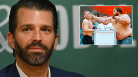 'Sums it up perfectly!' Donald Trump Jr uses 'Russian Slapping Champion' to mock Democrats & impeachment inquiry into his dad