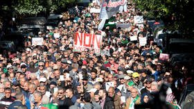 Thousands of Algerians march to demand cancellation of presidential election