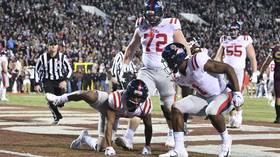 'P*ss and miss': Bizarre dog-peeing celebration costs college football team Ole Miss dear in Egg Bowl (VIDEO)