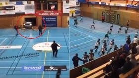 ‘A miracle no one was hurt’: Handball players flee as CAR crashes through gym wall during game (VIDEO)