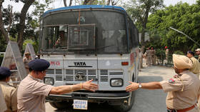 Woman with hands, legs tied rescued from would-be rapist by police after high speed car chase in India