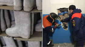 Siberian man falls 9 stories head-first down VENT SHAFT & survives thanks to FELT BOOTS he dropped there earlier