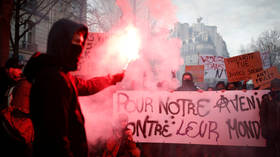 Tens of thousands march in Paris in ongoing strikes against pension reform