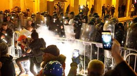 Lebanese protesters block roads after designation of Hezbollah-backed Diab as new PM