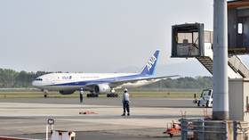 WATCH: ANA passenger jet makes emergency landing at Fukuoka Airport with ENGINE ON FIRE