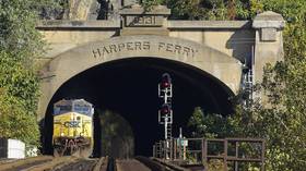 DRAMATIC VIDEO shows aftermath as cargo train plunges from bridge near historic Harpers Ferry outside Washington, DC